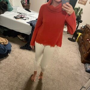 Small Anthropologie orange sweater